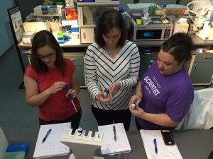 We are practicing our pipetting skills! 