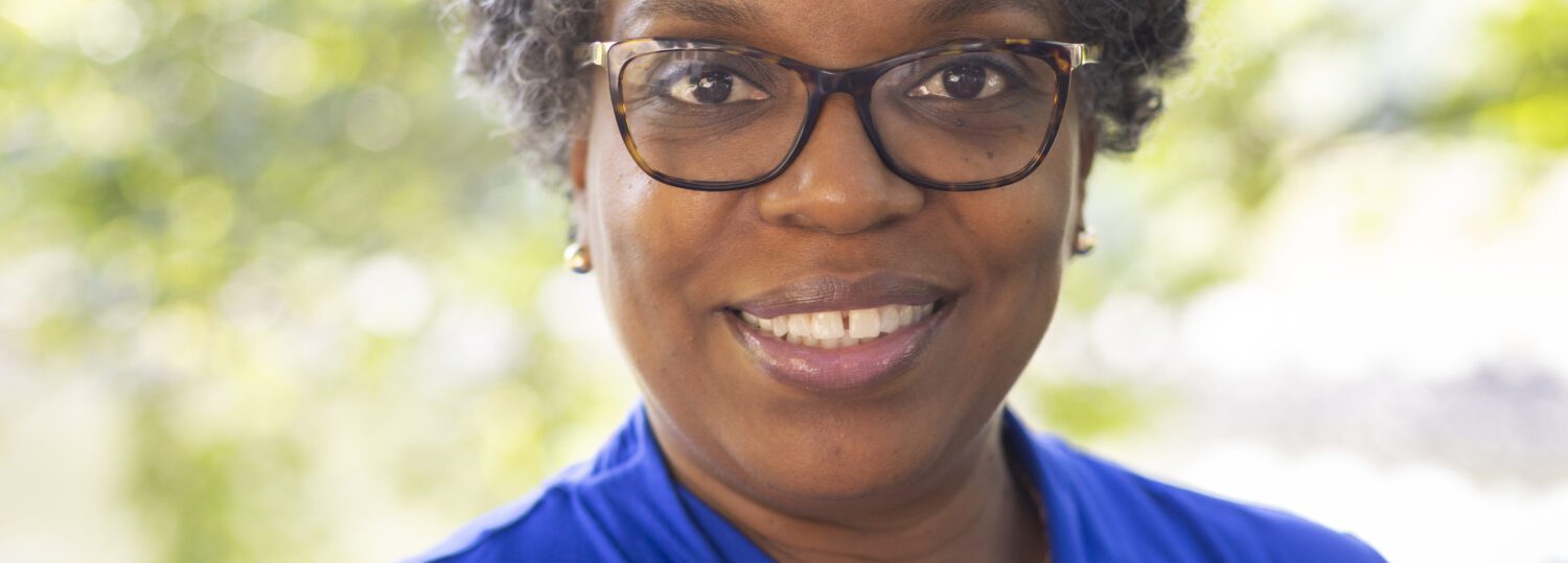 Headshot of Shavonne Speight wearing a blue blouse.