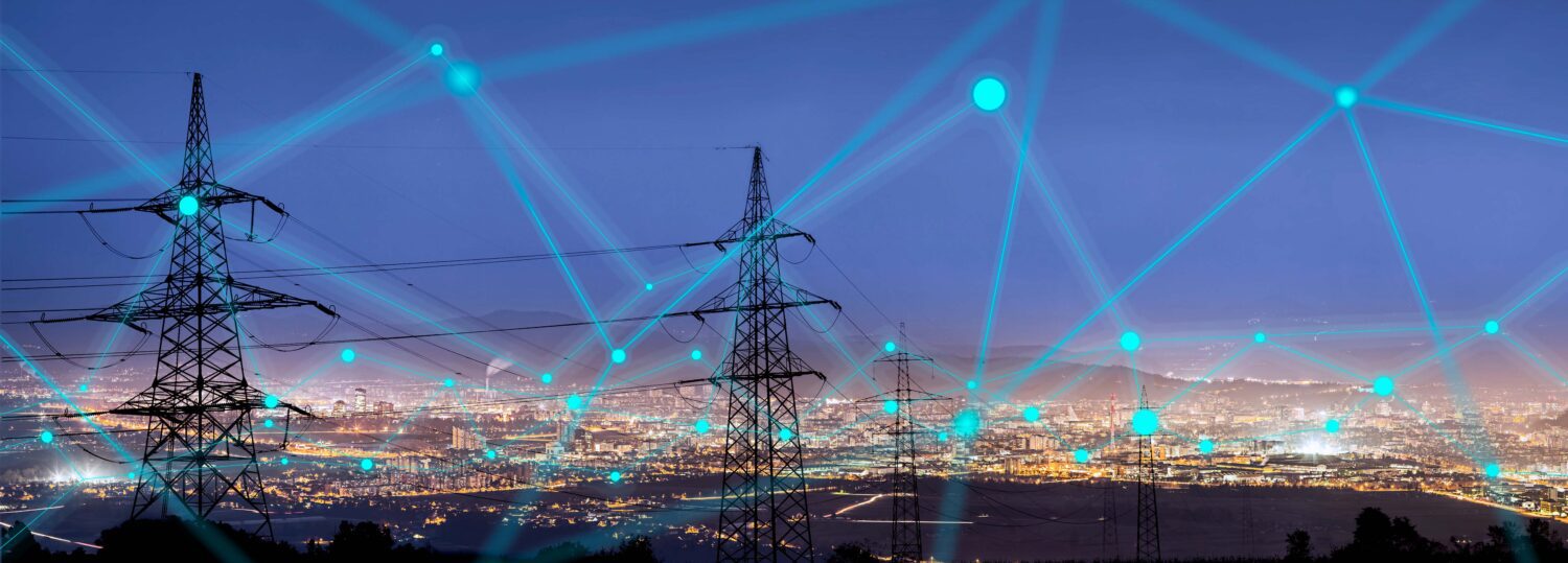 High power electricity poles in urban area connected to smart grid. Energy supply, distribution of energy, transmitting energy, energy transmission, high voltage supply concept photo.